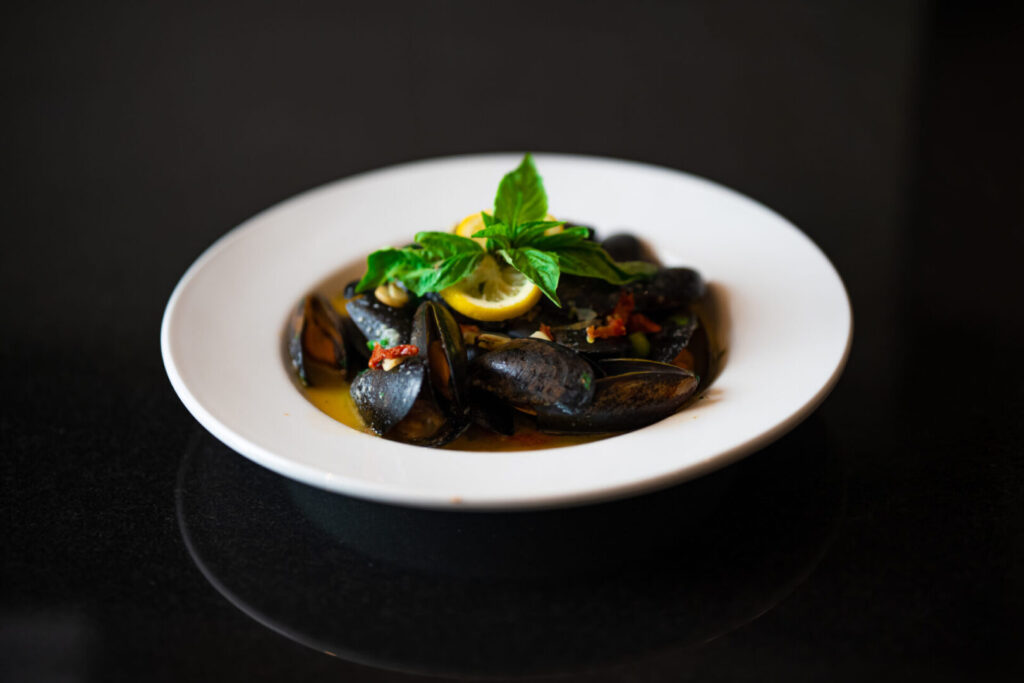 freshly cooked mussels in special sauce by Espositos Pizza Bar and Restaurant